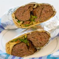 2. Beef Kebab Wraps · Ground beef mix with our famous spices, salad, onion tomato, fresh made hummus.