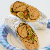 1. Chicken Kebab Wraps · Ground chicken mix with our spices, salad, onion, tomato, made in the house garlic.