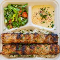 2. Chicken Kebabs Plate · Two skewers of ground beef kebab,Hummus, salad and rice