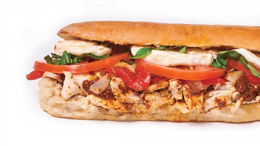 Chicken Florence · Fresh mozzarella, tomatoes, roasted red pepper, grilled onion, basil, mayo, tomato spread.