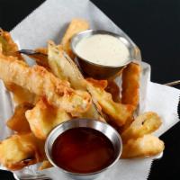 MA Kuer Tod · Crispy fried eggplant strips, roasted sesame batter served with sweet chili dipping and hous...