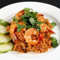 Kao Pad Tom Yum · Spicy and sour fried rice with shrimp, mushroom, tomatoes, chili jam, lemongrass and kefir l...