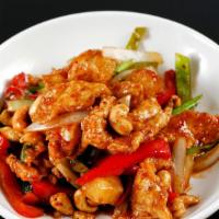 Gai Med Mamuang · Light fried chicken stir fry with cashew nut, onion, bell pepper, pineapple and roasted chil...