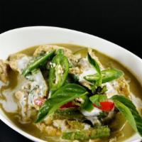 Kang Kiew Wan Gai · Original Thai green curry with chicken, Thai eggplant, serrano pepper, and basil. Served wit...