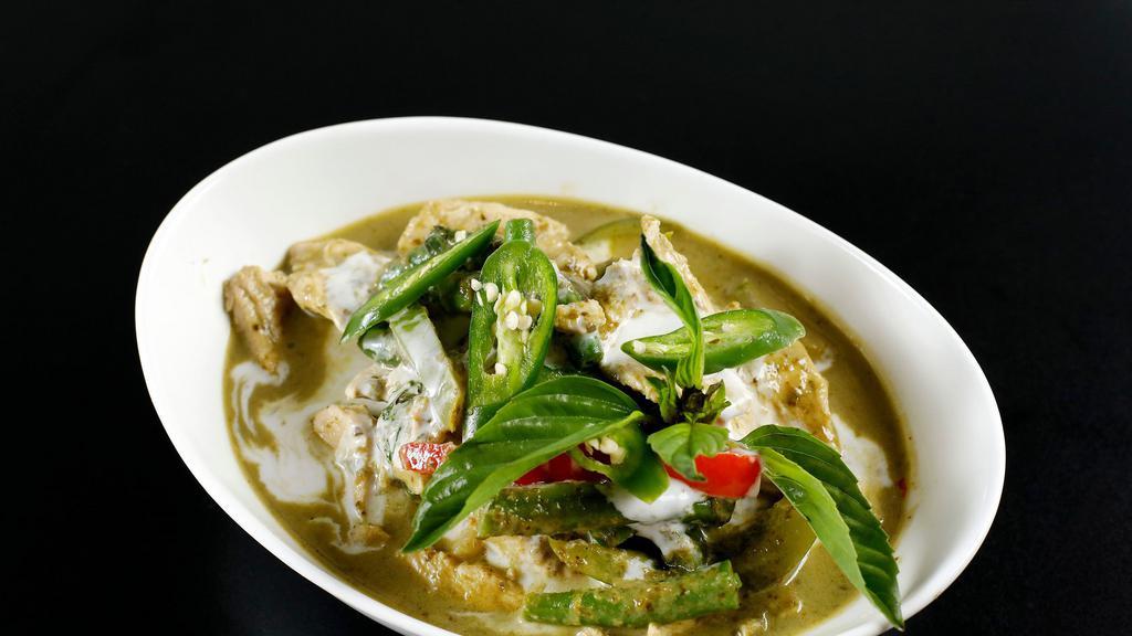 Kang Kiew Wan Gai · Original Thai green curry with chicken, Thai eggplant, serrano pepper, and basil. Served with jasmine rice.