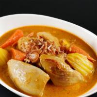 Kang Ka RI Gai · Braised chicken thigh, potatoes, carrot, and onion in yellow curry. Served with jasmine rice.