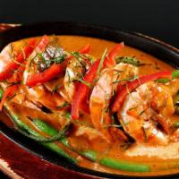 Choo Chee Goong · Grilled tiger prawns topped with reduced red curry sauce, kefir lime leaf and pepper. Served...