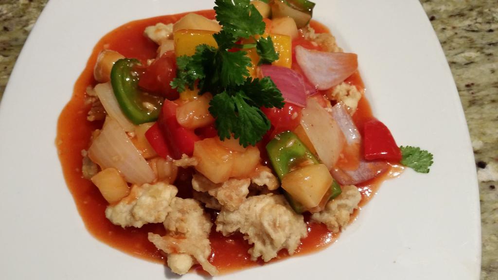 Sweet & Sour Chicken · Sauteed in our special fresh orange, lemon, tomato sauce tossed with fresh pineapple.