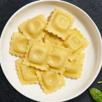Bologna's Butternut Squash Ravioli · Butternut squash ravioli cooked with sauces and toppings of your choice.