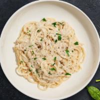 Arezzo's Chicken Alfredo Pasta · Free range chicken breast, garlic and linguini pasta cooked in our very own authentic Parmig...