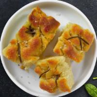 Florence's Garlic Focaccia with Marinara Dipping Sauce · Oven baked, Italian bread flavored with extra virgin olive oil & Garlic and Served with Mari...