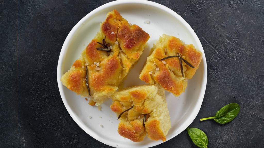 Florence's Garlic Focaccia with Marinara Dipping Sauce · Oven baked, Italian bread flavored with extra virgin olive oil & Garlic and Served with Marinara dipping sauce