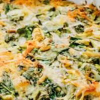 Aprilia's Artichoke and Spinach Dip · Oven baked dip made with artichokes, Mozzarella, Garlic and Parmigiano served with small pie...