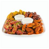 Wing Platter (100 Pcs.) · 100 wings, carrots and celery, choice of four 6 oz house-made sauces, up to four flavors.