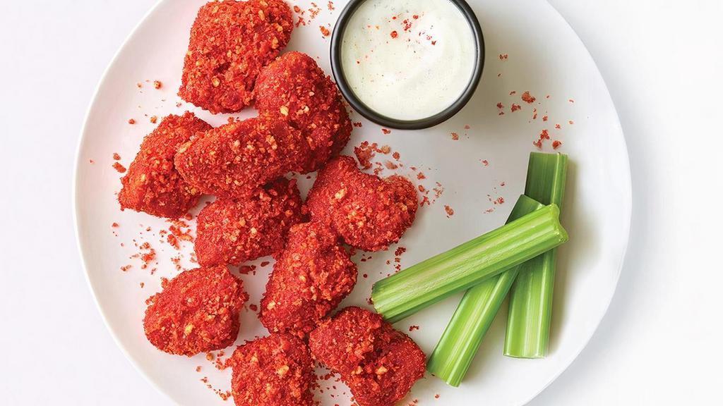 Boneless Wings With Cheetos® Flamin' Hot® Wing Sauce · Boneless wings tossed in sauce and coated in crunchy Cheetos crumbles.