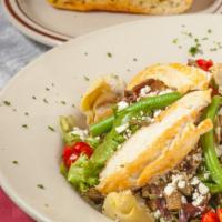 Mediterranean Salad · An entrée spring mix salad with grilled chicken, roasted vegetables, mixed olives, beans, ar...