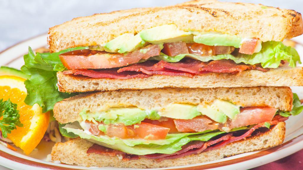 The A.B.L.T. Sandwich · Avocado, bacon, mayonnaise, lettuce and tomato.