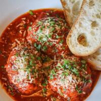 Meatballs · House made beef and pork meatballs. Served with a side of House Marinara and three pieces of...
