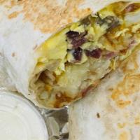 3 Meat Burrito · Scrambled eggs, hash browns, bacon, sausage, ham, cheddar, and jack cheese wrapped in a flou...