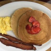 Pancake Combo · Two pancakes, two eggs, and choice of two link sausage or two strips of bacon.