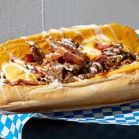 Bacon Ranch Cheesesteak · Sliced ribeye steak, melted cheese, bacon, ranch, hoagie roll.