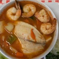 Caldo Mixto · Stew mix with shrimp, and fish, carrot, pumpkin, corn, potatoes, and cilantro, served with r...