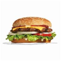 Famous Star® With Cheese · Char-broiled all-beef patty, melted American cheese, lettuce, tomato, sliced onions, dill pi...