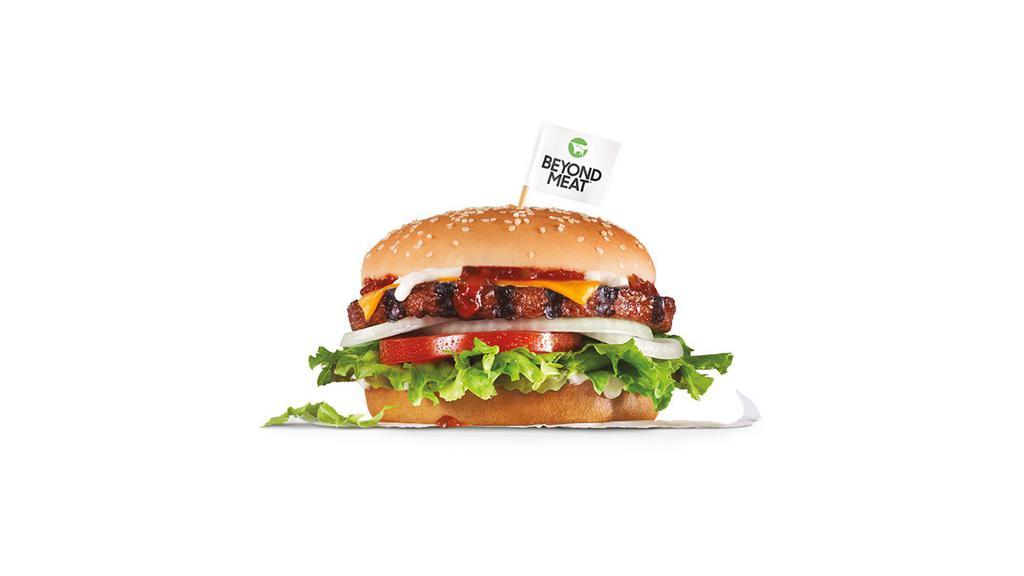 Beyond Famous Star® With Cheese · Char-broiled 100% plant-based Beyond Burger® patty on our iconic Famous Star®, featuring melted American cheese, lettuce, tomato, sliced onions, dill pickles, special sauce, and mayonnaise on a seeded bun.
