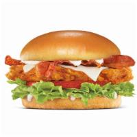 The Bacon Swiss Crispy Chicken Fillet Sandwich · A crispy chicken fillet dusted with Southern spices, topped with bacon, swiss cheese, lettuc...