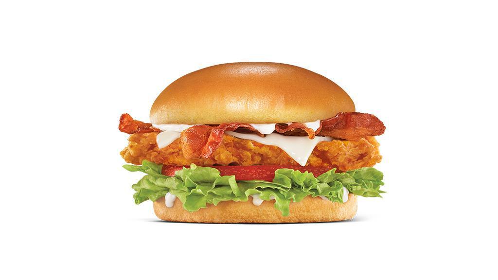 The Bacon Swiss Crispy Chicken Fillet Sandwich · A crispy chicken fillet dusted with Southern spices, topped with bacon, swiss cheese, lettuce, tomato, and ranch dressing on a premium bun.
