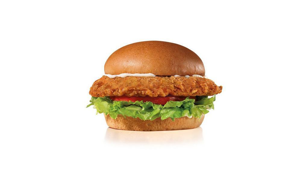 The Big Chicken Fillet Sandwich · A crispy chicken fillet dusted with Southern spices, topped with lettuce, tomato, and mayonnaise on a premium bun.