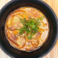 Spicy Miso Ramen · Pork Base Broth, Pork Chashu, House Made Miso Paste, Chili Oil, Green Onion.
