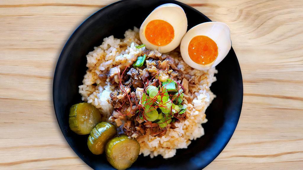 Minced Chashu Bowl · Pork Chashu Over Steamed Rice, Marinated Egg, Green Onion, Sweet Pickled Cucumber.