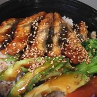 Unagi Don · Eel with avocado over rice, served with vegetable, soup & salad