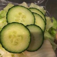Green Salad · Fresh lettuce with sliced cucumber and thousand island dressing
