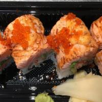 Lion King Roll · California Roll with Seared Salmon, Tobiko & Special Sauce on Top. Spicy