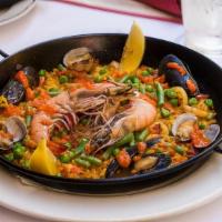 Paella B44 · Gluten free. shrimp, squid, mussels, clams, chorizo, chicken, vegetables.