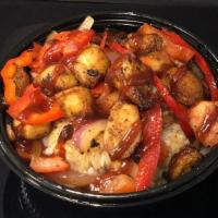 BBQ Chicken Hot Bowl · Savory marinated chicken, onions, bell peppers, and tomatoes, drizzled with BBQ sauce and se...