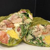 Chicken Cobb Wrap · Avocado, grilled chicken, smoked bacon, eggs, tomatoes, blue cheese, greens, buttermilk-herb...