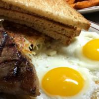 NY Steak & Eggs · 10oz NY Steak Cooked To Order Served With Two Eggs And Toast.