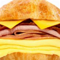 Ham, Bacon, Egg & Cheese Croissant · Served with American cheese.
