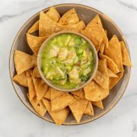 Baja Shrimp Ceviche · fresh lime, avocado, Fresno chilies, cilantro, housemade tortilla chips