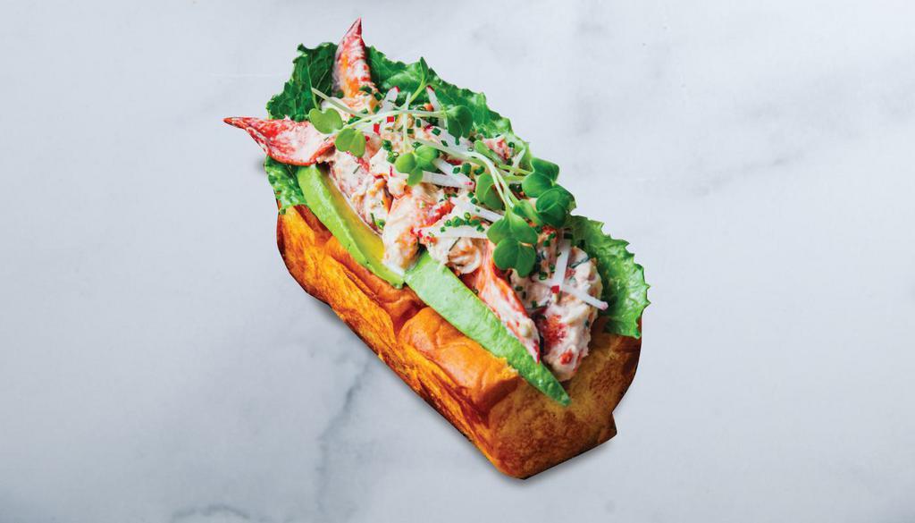 Lobster Roll · tarragon-dill lobster salad, avocado, radish, romaine, chives, butter-toasted King’s® Hawaiian roll, with sesame slaw, choice of fries