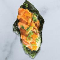 Spicy Salmon Sushi Taco · salmon, avocado, sriracha aioli, scallions, crispy shallots
