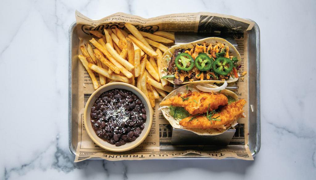 Taco Platter (2) · mix & match two tacos, black beans, choice of fries, house side salad or tortilla chips
