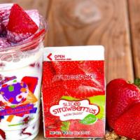 Frozen Strawberries Dessert · Frozen Strawberries cut into cubes with sweet cream and your choice of toppings