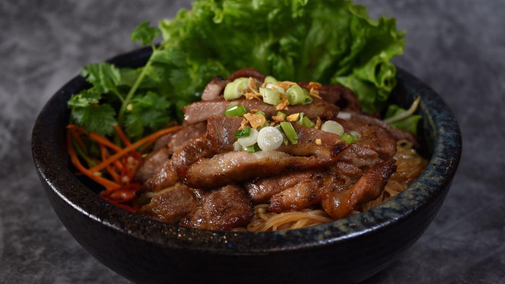 Pork Bowl · Thin rice noodle, BBQ pork, bean sprout, green onion, cilantro, romaine lettuce, house made dark sauce, crispy garlic.