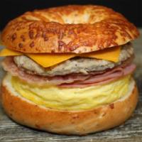 7. Meat Lover's Deluxe · Egg, cheese, sausage, bacon and turkey ham served on your choice of bagel.