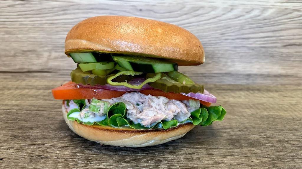 Tuna Salad Sandwich Lunch · Bagel with our home-made tuna salad. Comes with mayo, mustard, lettuce, tomato, onion, cucumbers, pickles, and pepperoncini.