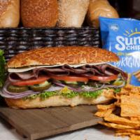 Salami Bagel · Salami with mayo, mustard, lettuce, pickles, tomatoes, peppers, onions, sprouts and cucumbers.
